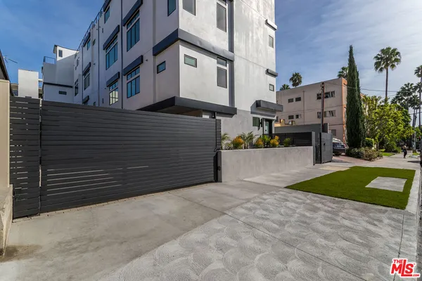 a view of a building with a street