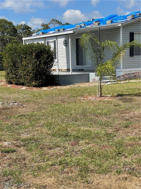 20560 Holiday Drive Estero, FL 33928 - Photo 11 of 33 a view of a backyard