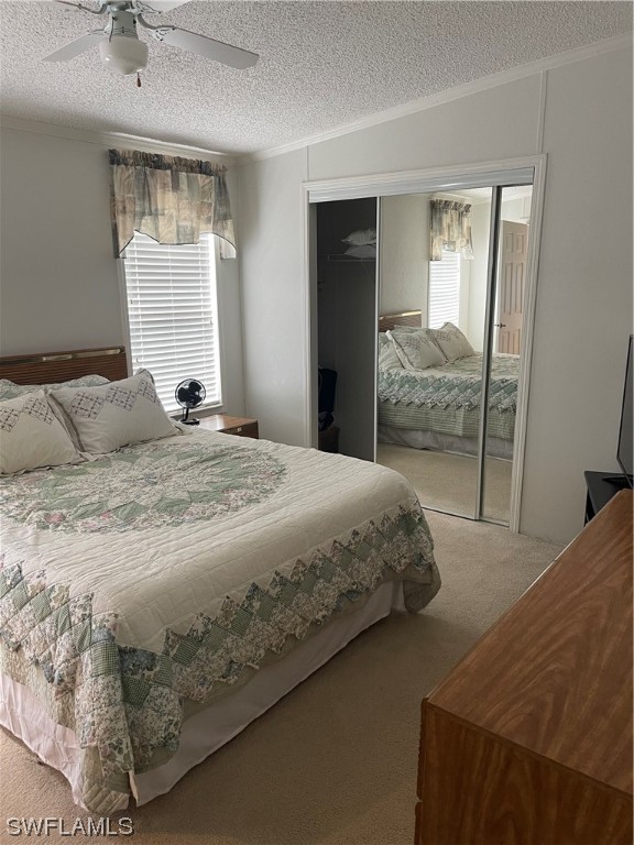 20560 Holiday Drive Estero, FL 33928 - Photo 21 of 33 a bedroom with a bed and a window