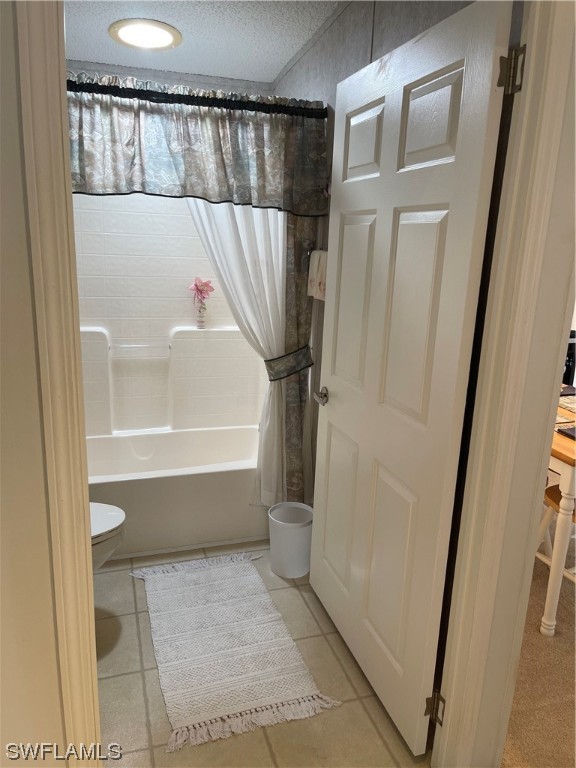 20560 Holiday Drive Estero, FL 33928 - Photo 22 of 33 a bathroom with a bathtub and a shower