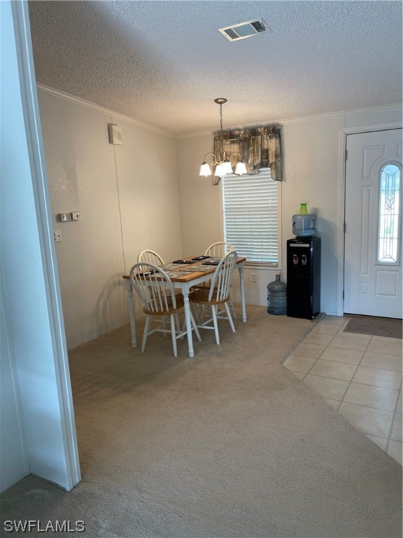 20560 Holiday Drive Estero, FL 33928 - Photo 30 of 33 a dining room with furniture and window