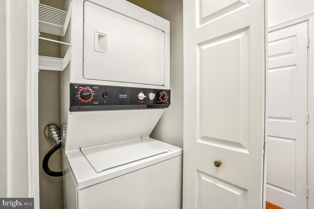 14809 Pennfield Circle, Unit 105 Silver Spring, MD 20906 - Photo 14 of 29 a close up view of a washer and dryer