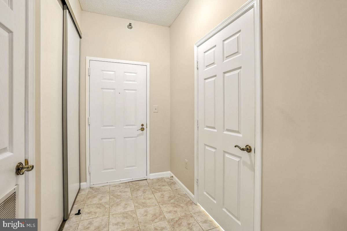 14809 Pennfield Circle, Unit 105 Silver Spring, MD 20906 - Photo 15 of 29 a view of a bathroom with a sink