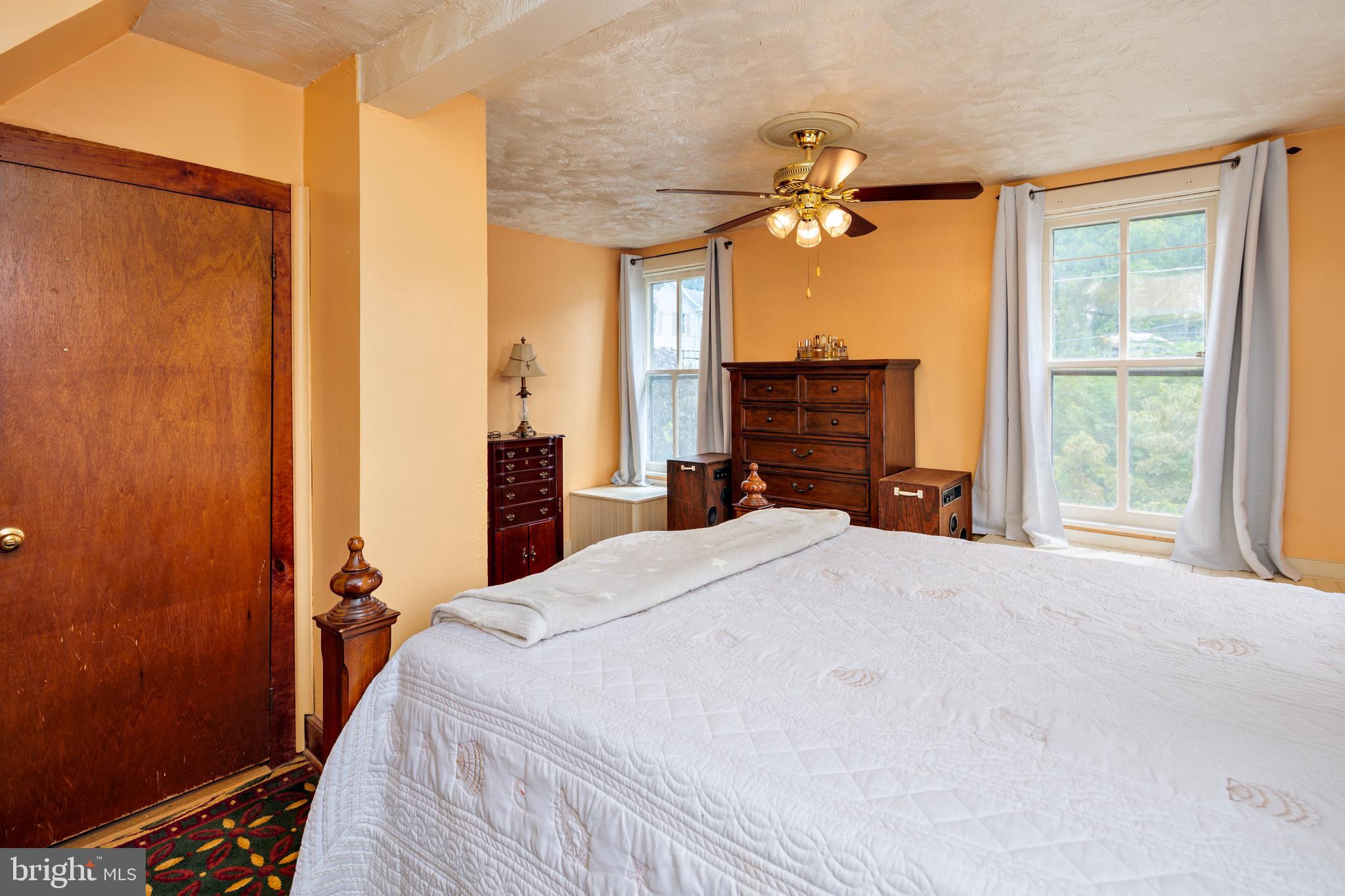 325 Main Street Delta, PA 17314 - Photo 24 of 41 a bedroom with a bed dresser and a window