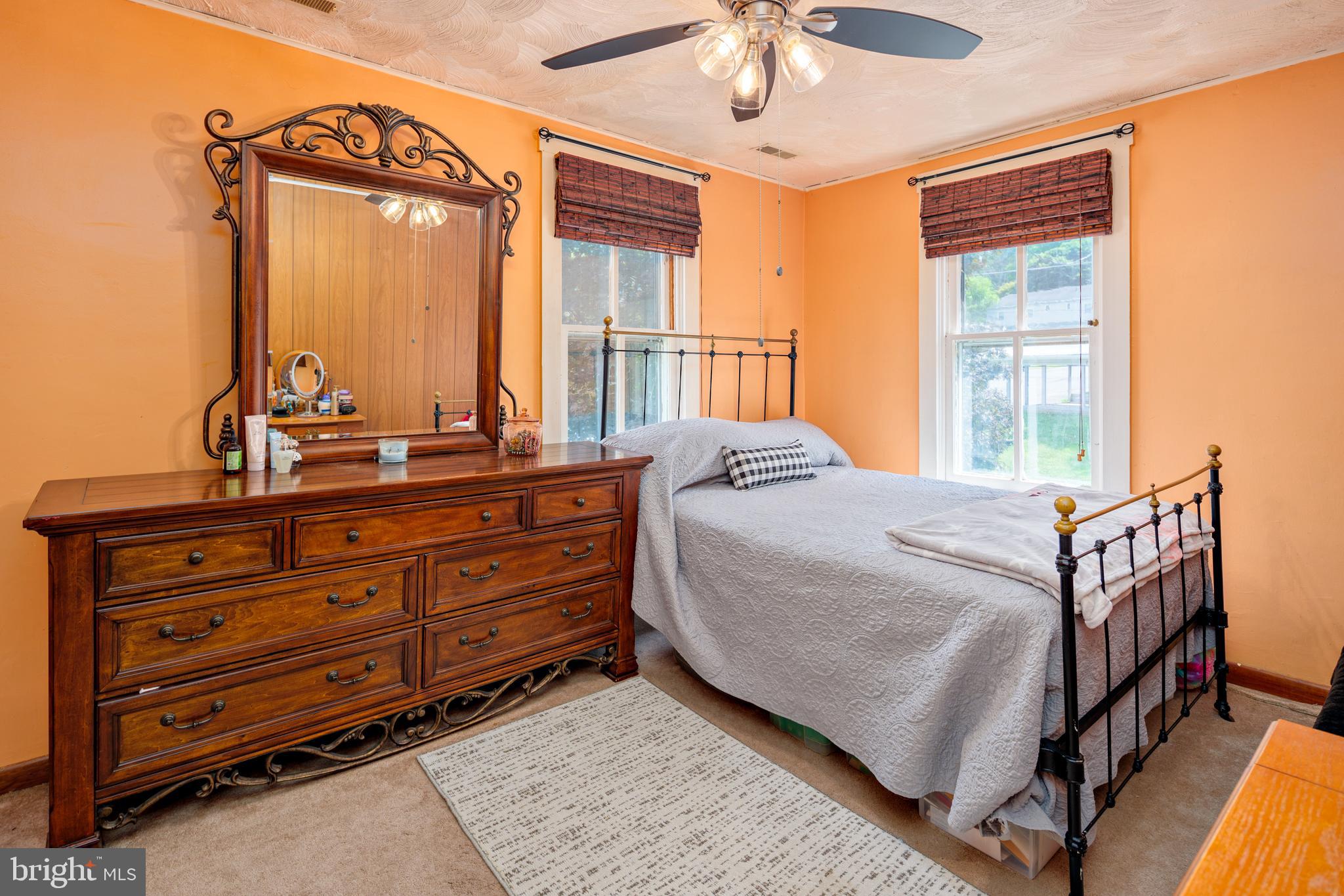 325 Main Street Delta, PA 17314 - Photo 25 of 41 a bedroom with a bed and a dresser