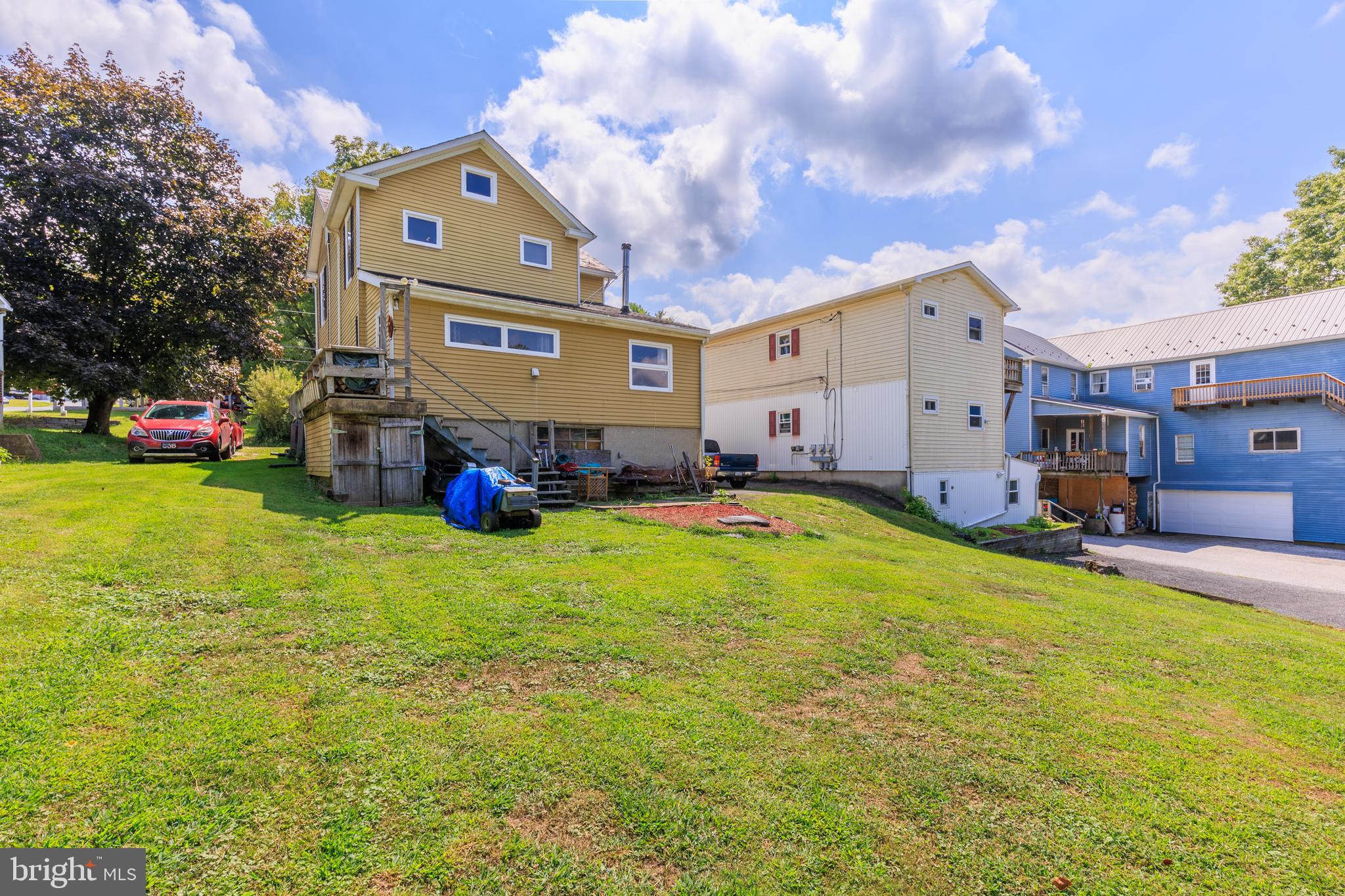 325 Main Street Delta, PA 17314 - Photo 39 of 41 a front view of house with yard and seating area