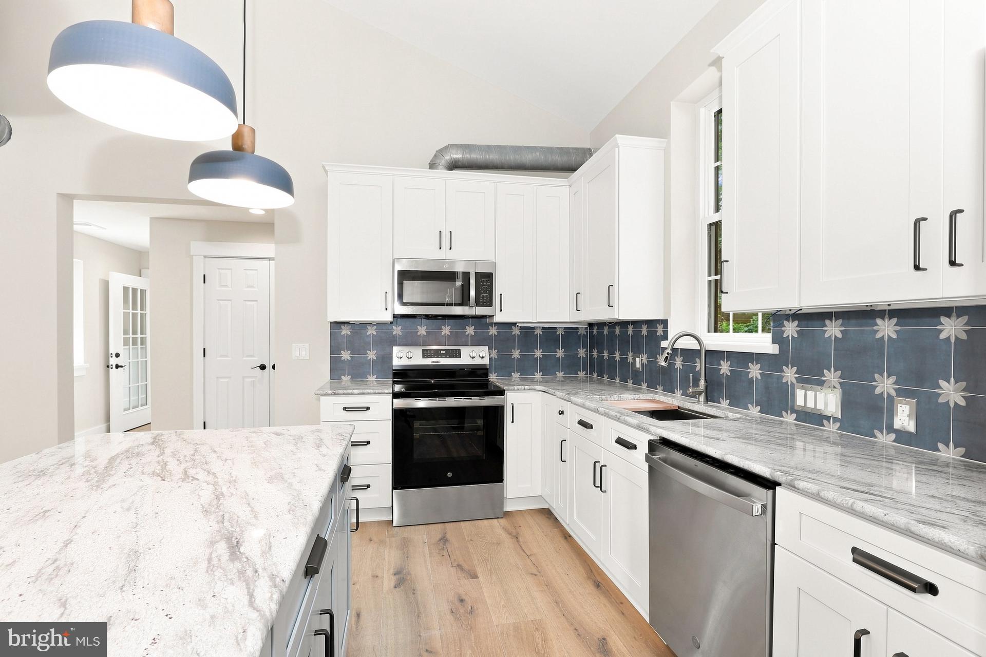 5567 Pennell Road Aston, PA 19014 - Photo 5 of 15 Modern kitchen with stylish accents.