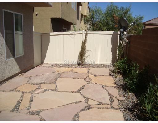 9371 Roping Cowboy Avenue Las Vegas, NV 89178 - Photo 14 of 17 Yard/Garden. Backyard