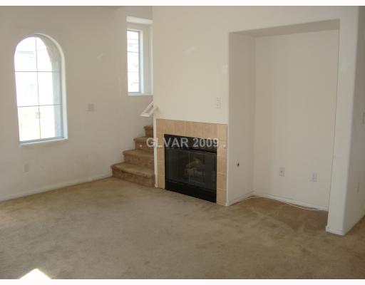 9371 Roping Cowboy Avenue Las Vegas, NV 89178 - Photo 3 of 17 Living Room.