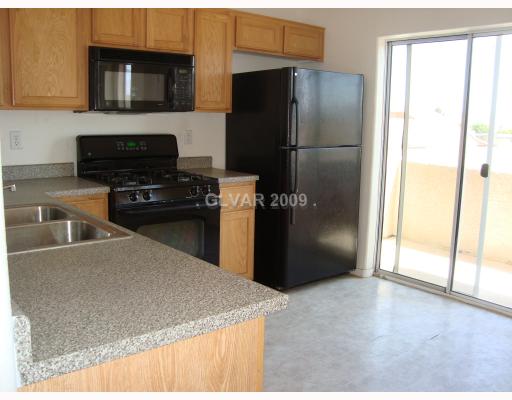 9371 Roping Cowboy Avenue Las Vegas, NV 89178 - Photo 5 of 17 Kitchen.