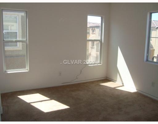 9371 Roping Cowboy Avenue Las Vegas, NV 89178 - Photo 7 of 17 Master Bedroom.