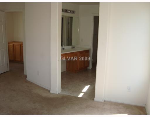 9371 Roping Cowboy Avenue Las Vegas, NV 89178 - Photo 8 of 17 Master Bedroom.