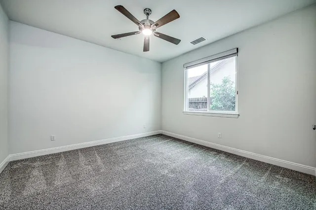 an aerial view of a house with outdoor space swimming pool