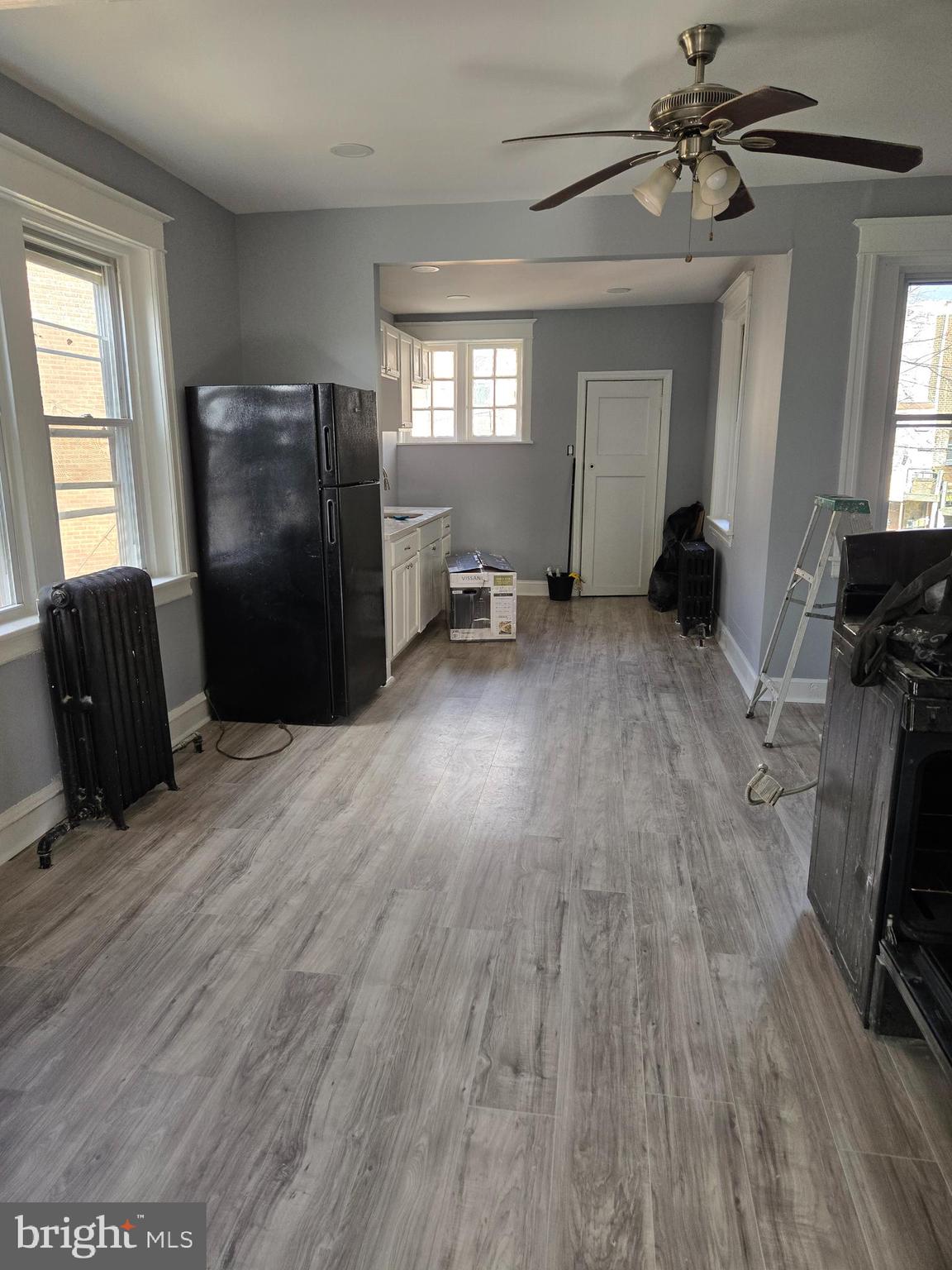 933 Keystone Road Chester, PA 19013 - Photo 5 of 8 a living room with furniture and a flat screen tv
