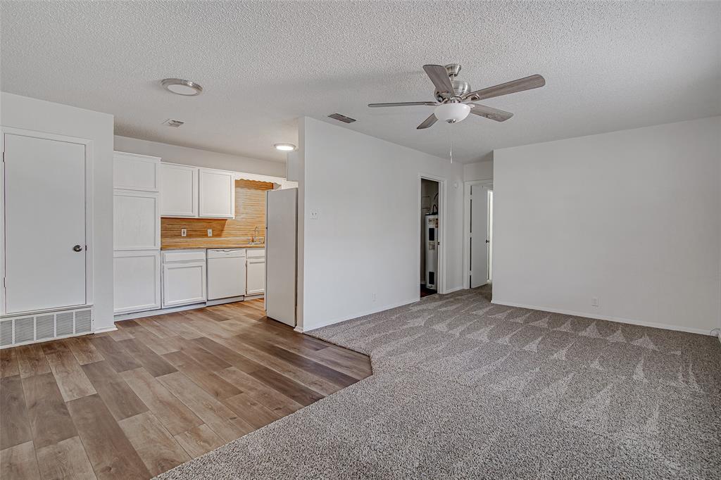 1312 Ridge Run Street, Unit A Cleburne, TX 76033 - Photo 2 of 16 a view of a kitchen with a sink and cabinet area