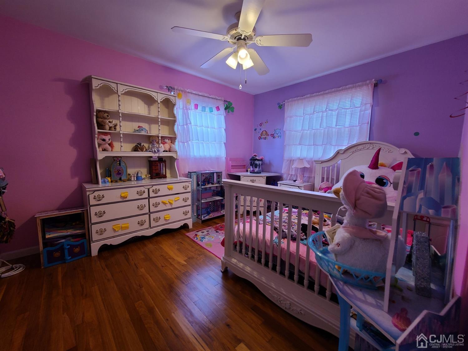 8 Chelsea Road Old Bridge, NJ 08857 - Photo 5 of 15 a bedroom with furniture and a baby crib