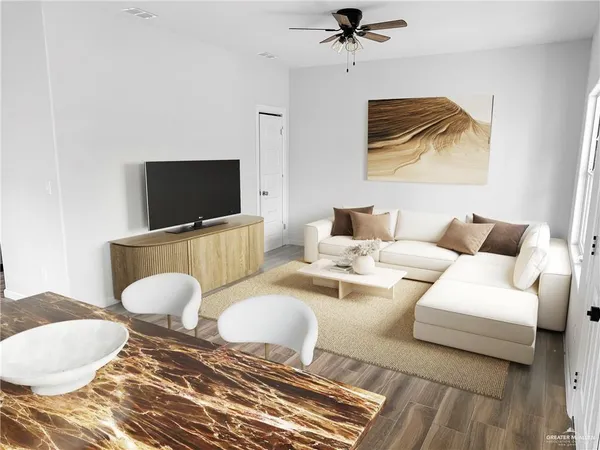 a living room with furniture and a flat screen tv