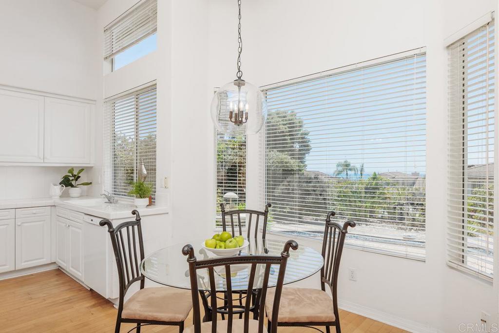250 Pacific View Lane Encinitas, CA 92024 - Photo 15 of 40 a view of a dining room with furniture window and outside view
