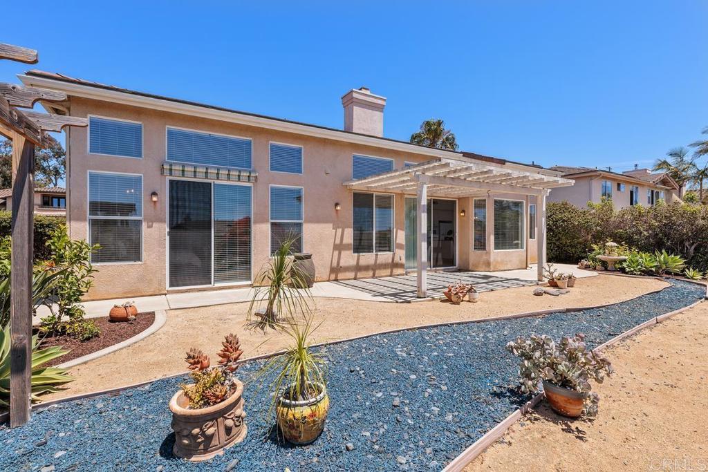 250 Pacific View Lane Encinitas, CA 92024 - Photo 36 of 40 a view of a house with backyard porch and sitting area