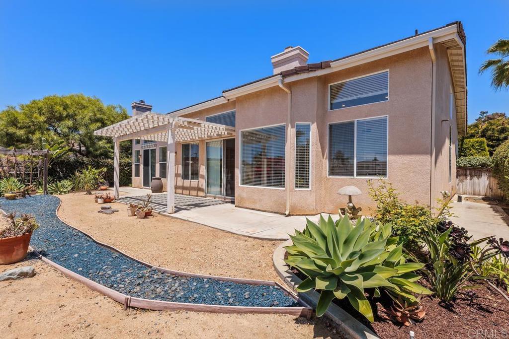 250 Pacific View Lane Encinitas, CA 92024 - Photo 37 of 40 a view of a house with backyard sitting area and porch