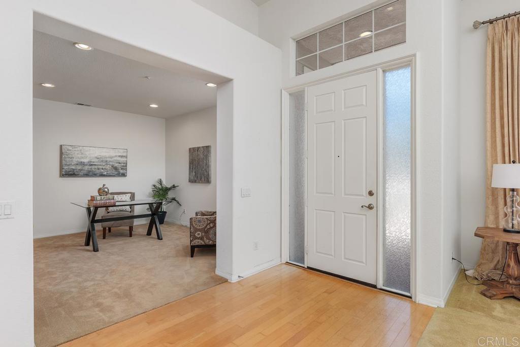 250 Pacific View Lane Encinitas, CA 92024 - Photo 6 of 40 a view of a livingroom with couch and a bathroom