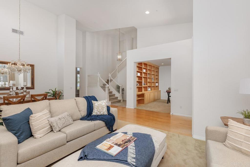 250 Pacific View Lane Encinitas, CA 92024 - Photo 8 of 40 a living room with furniture and a wooden floor