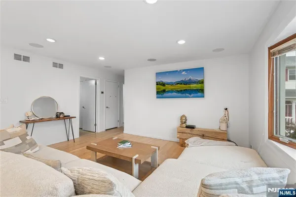 a bedroom with a bed and a cabinets