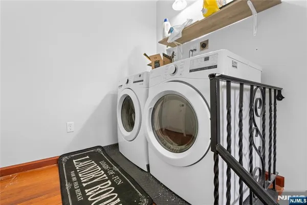 a utility room with dryer and washer