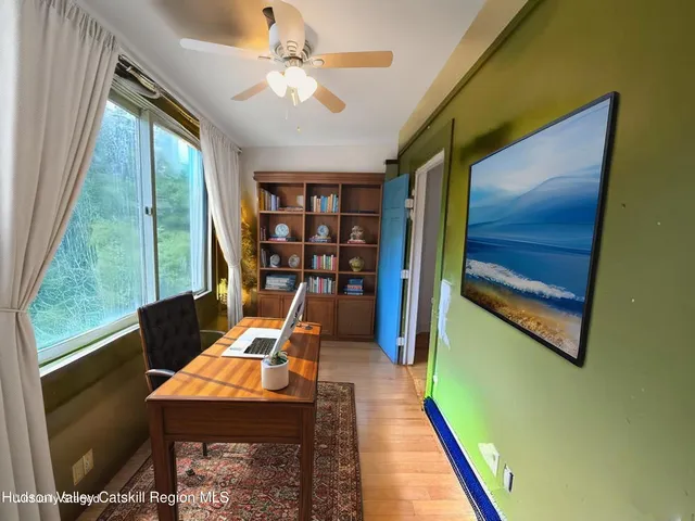 a room with furniture water view and a window