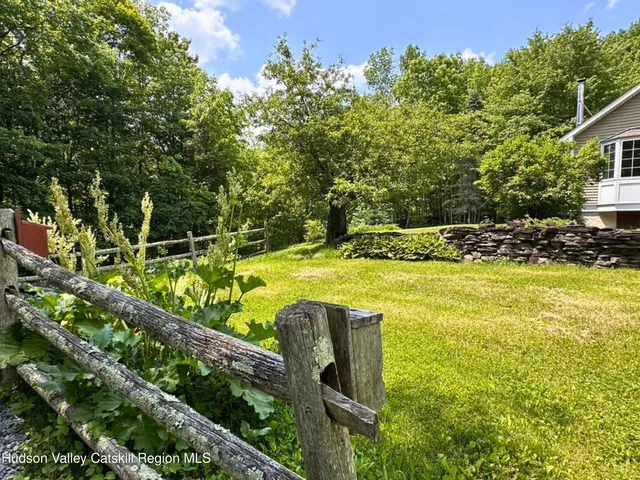 a garden view with a lake view