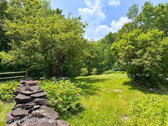 a garden view with a seating space