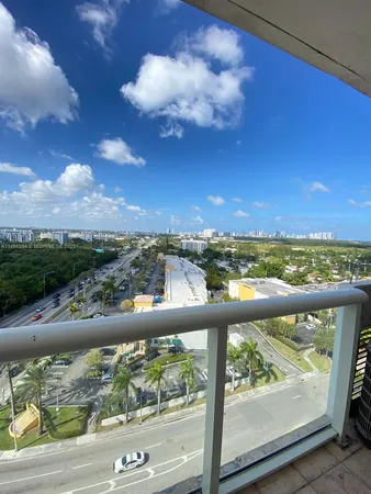 a view of a balcony with city view