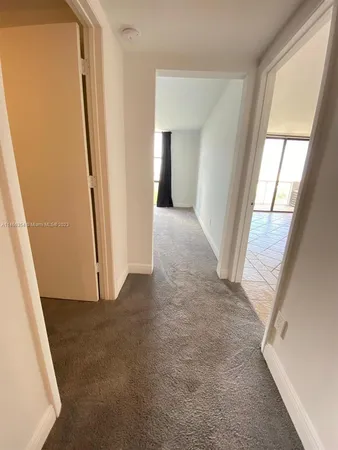 a view of an empty room with window