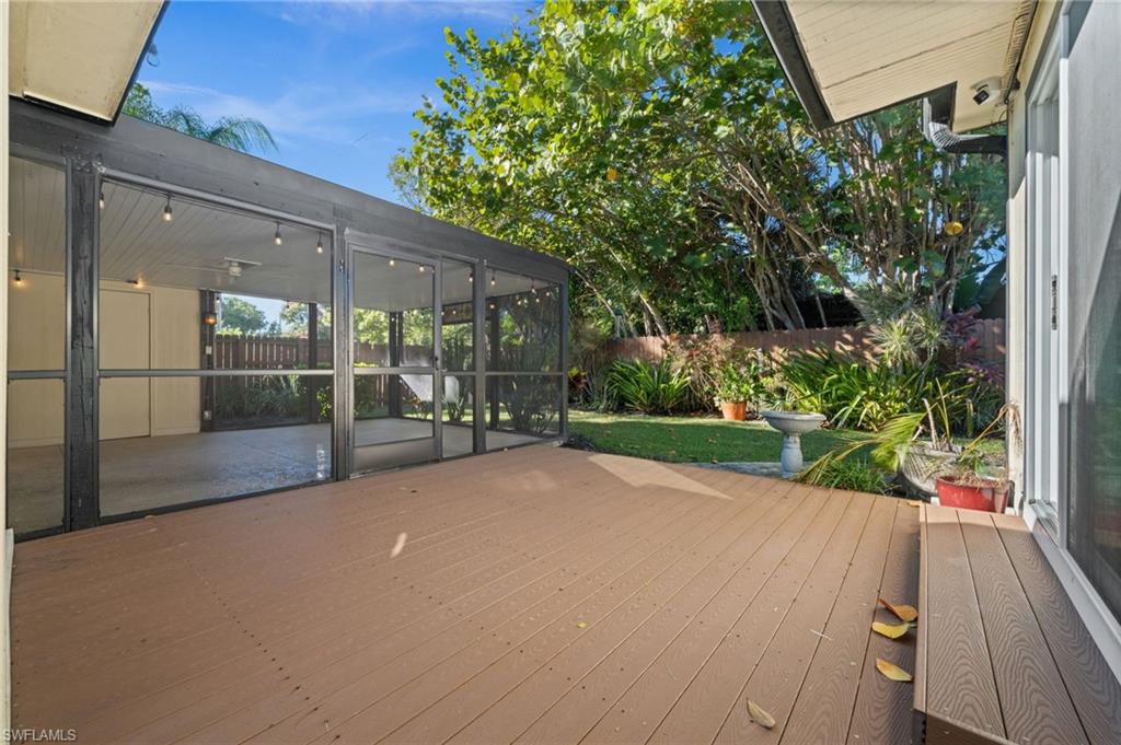 715 10th Street North Naples, FL 34102 - Photo 21 of 36 a view of backyard with plants