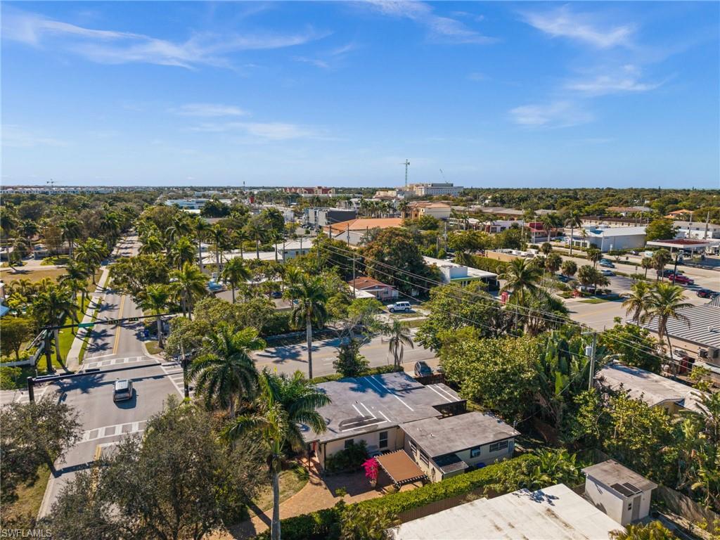 715 10th Street North Naples, FL 34102 - Photo 30 of 36 an aerial view of residential houses with city view