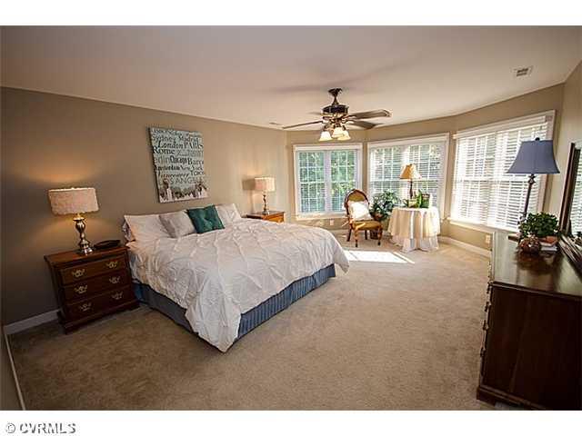 913 Rise Shaft Road Midlothian, VA 23114 - Photo 11 of 24 Master Bedroom - Escape to your Master retreat with a large bay window, separate dressing area with his and her walk-in closets.