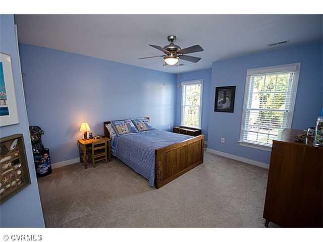 913 Rise Shaft Road Midlothian, VA 23114 - Photo 17 of 24 Bedroom - This bedroom shairs a jack/jill bath with the fourth bedroom. Notice the high-end light fixtures throughout the house.