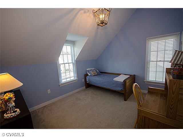 913 Rise Shaft Road Midlothian, VA 23114 - Photo 19 of 24 Bedroom - The fourth bedroom is vaulted and offers a lovely chandelier.