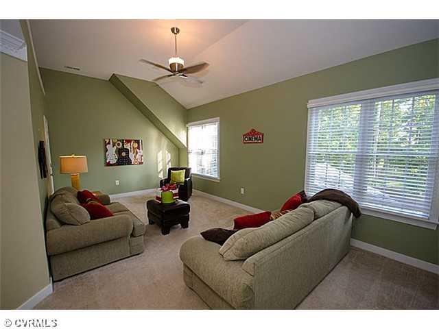913 Rise Shaft Road Midlothian, VA 23114 - Photo 20 of 24 Entertainment Room - A perfect 2nd story space that would make a great playroom or media room. It offers a vaulted ceiling, beautiful ceiling fan and large storage closet.