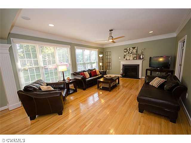 913 Rise Shaft Road Midlothian, VA 23114 - Photo 3 of 24 Den/Family/Great Room - The large family room, which is open to the kitchen via a magnificent arched opening offers French doors to living room, recessed lights, contemporary ceiling fan, built-in speakers and gas fireplace make this space a great place to enjoy.