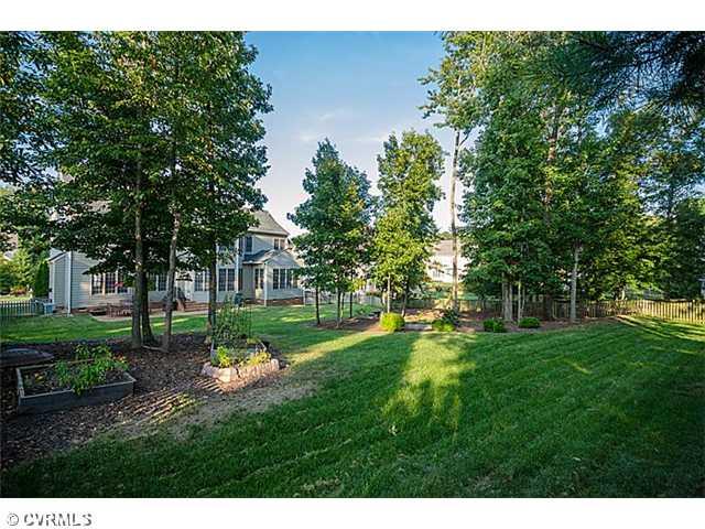 913 Rise Shaft Road Midlothian, VA 23114 - Photo 22 of 24 Yard/Garden - This is one of the largest yards in Kingham. It is fenced and has plenty of places to have a garden, play ball or just lay in a hammock and enjoy the day!