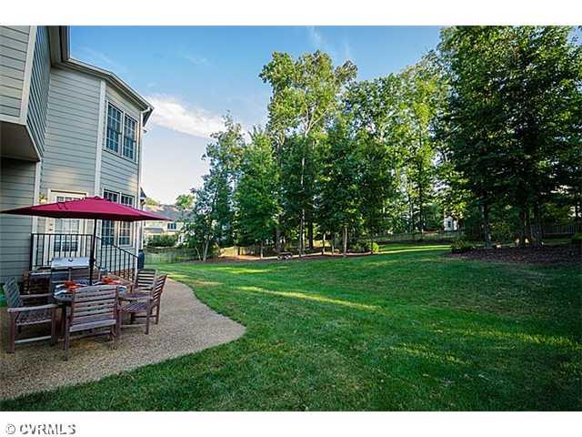 913 Rise Shaft Road Midlothian, VA 23114 - Photo 23 of 24 Exterior Back - The aggregate patio makes a perfect spot for dining 'Al Fresco'. Enjoy dinner with your family and friends under the stars.