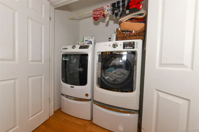 a utility room with dryer and washer