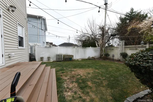 a view of a back yard of the house