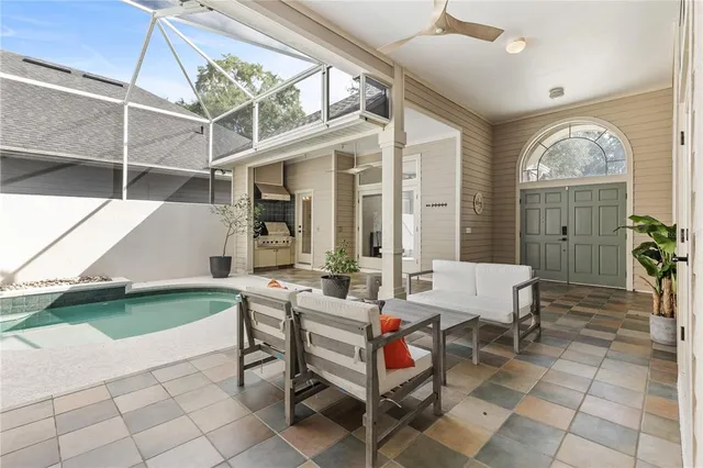 a outdoor space with lots of furniture and a bathtub