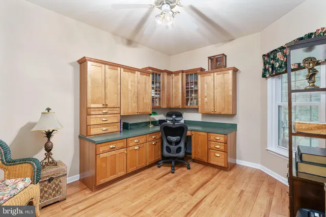 a view of a livingroom with a ceiling fan