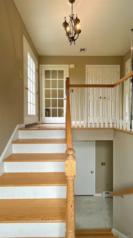 a view of a house with a ceiling fan