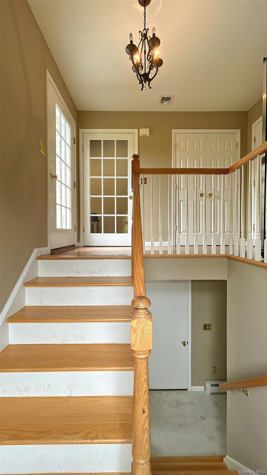 a view of a house with a ceiling fan