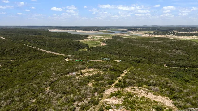 a view of an ocean and a mountain
