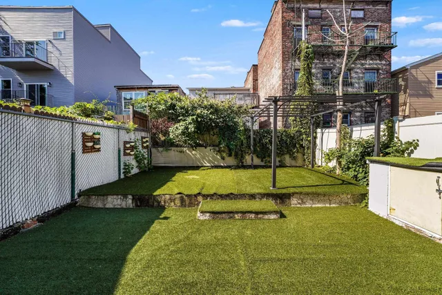 a view of a house with swimming pool